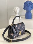 louis-vuitton-madeleine-bb-bicolor-monogram-empreinte-leather-handbags-M45978_PM2_Front-view.png