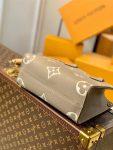 louis-vuitton-onthego-pm-bicolor-monogram-empreinte-leather-handbags-M45779_PM2_Front-view.png