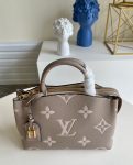 louis-vuitton-petit-palais-bag-bicolour-monogram-empreinte-leather-handbags-M58914_PM2_Front-view.png