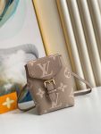 louis-vuitton-tiny-backpack-bicolor-monogram-empreinte-leather-small-leather-goods-M80738_PM2_Front-view.png